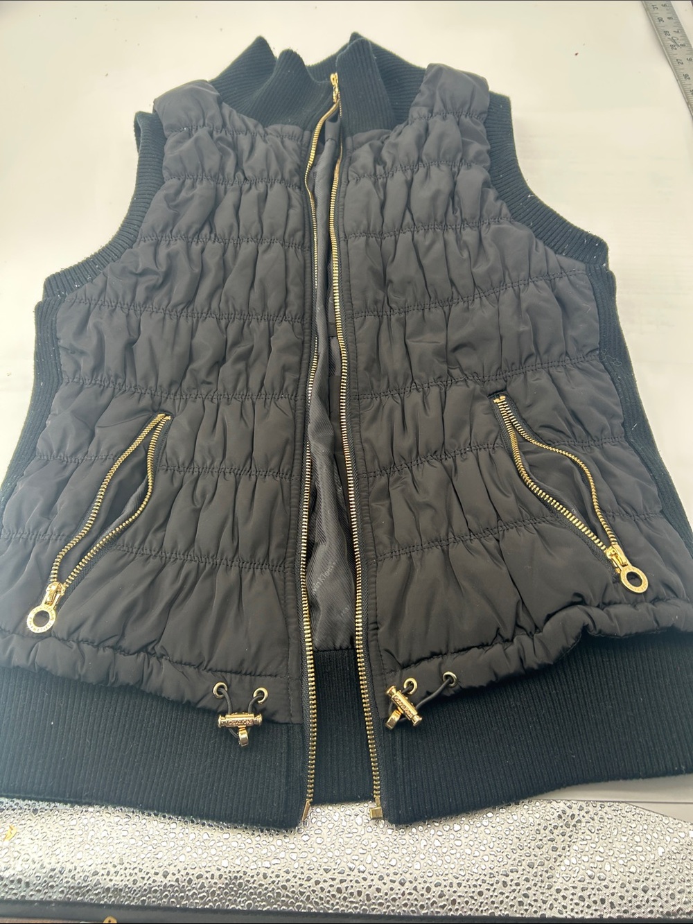 Women’s Black Quilted Puffer Vest with Gold Accents bust bust 32 length 23